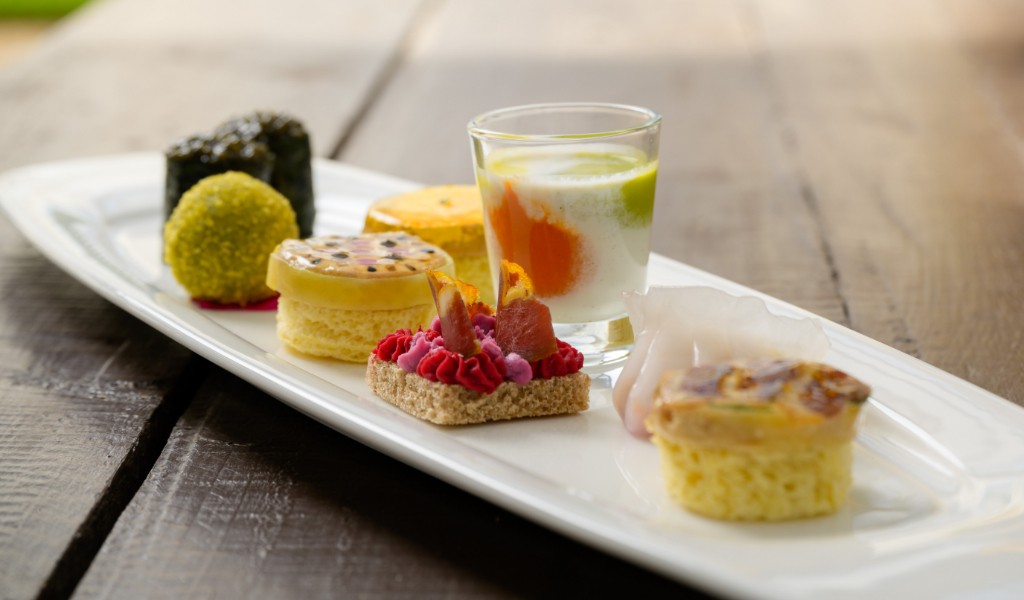 A white plate with a variety of desserts on it, perfect for private chef Bay Area events or corporate event catering.